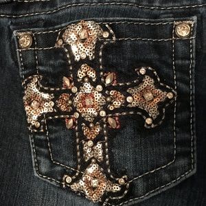 Size 27 miss me jeans. Cross on pockets. NWOT.